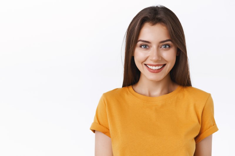 patient smiling with dental implants